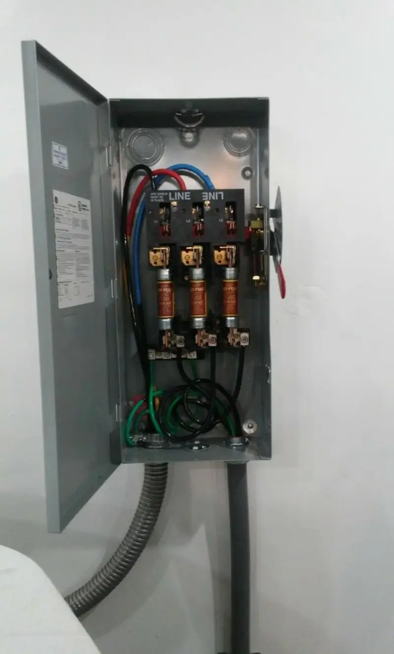 Three-phase disconnect switch installed for Smoke Detector Installation in Ashby